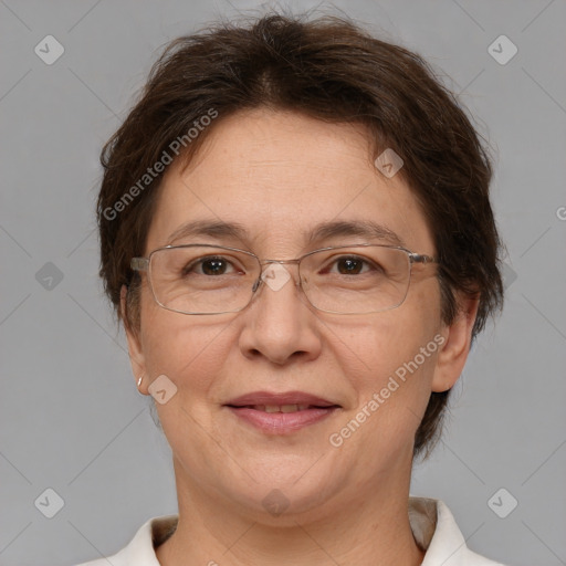 Joyful white adult female with short  brown hair and brown eyes