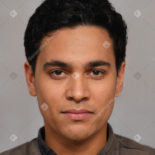 Joyful white young-adult male with short  black hair and brown eyes