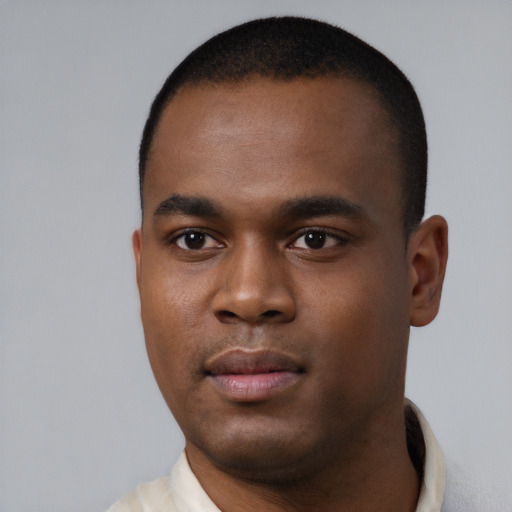 Neutral black young-adult male with short  black hair and brown eyes