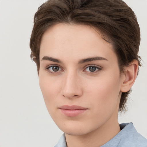 Neutral white young-adult female with short  brown hair and brown eyes