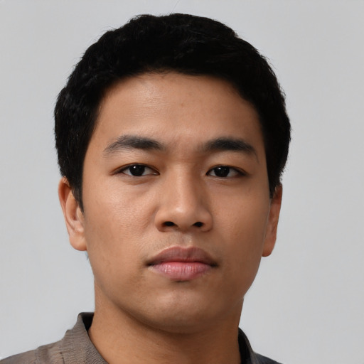 Neutral asian young-adult male with short  black hair and brown eyes