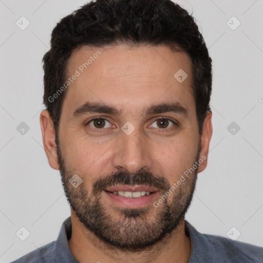 Joyful white young-adult male with short  black hair and brown eyes