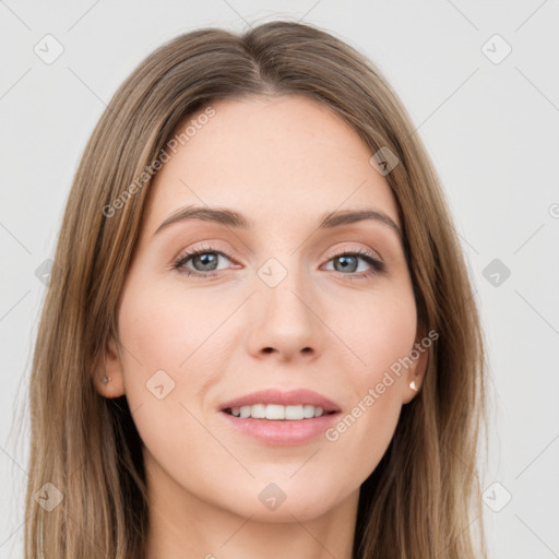 Joyful white young-adult female with long  brown hair and green eyes