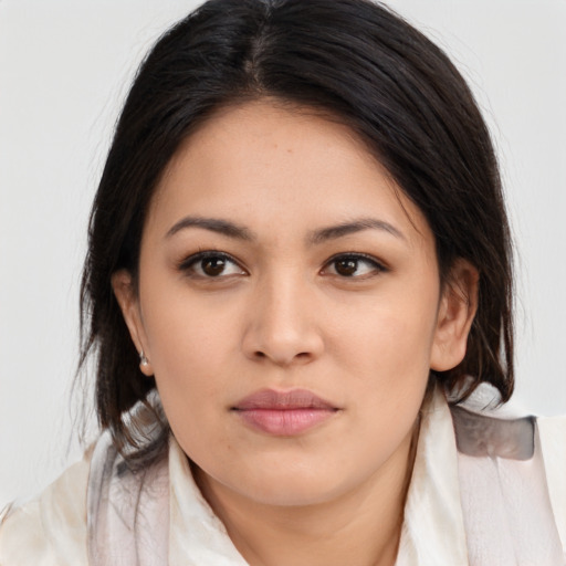 Neutral latino young-adult female with medium  brown hair and brown eyes