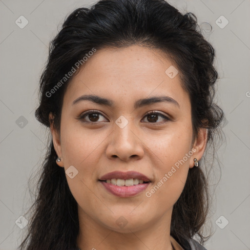 Joyful latino young-adult female with medium  brown hair and brown eyes