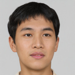 Neutral asian young-adult male with short  brown hair and brown eyes