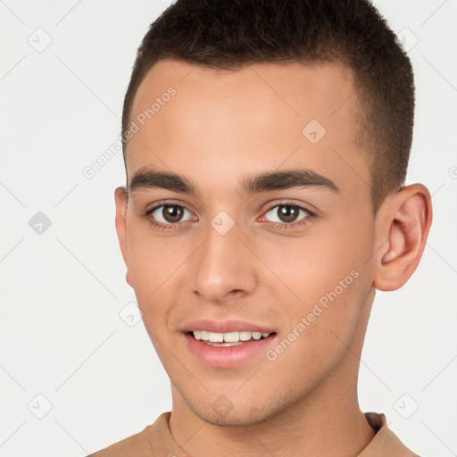 Joyful white young-adult male with short  brown hair and brown eyes