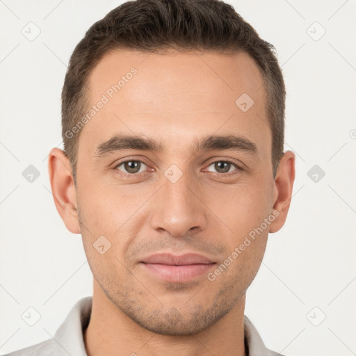 Joyful white young-adult male with short  brown hair and brown eyes