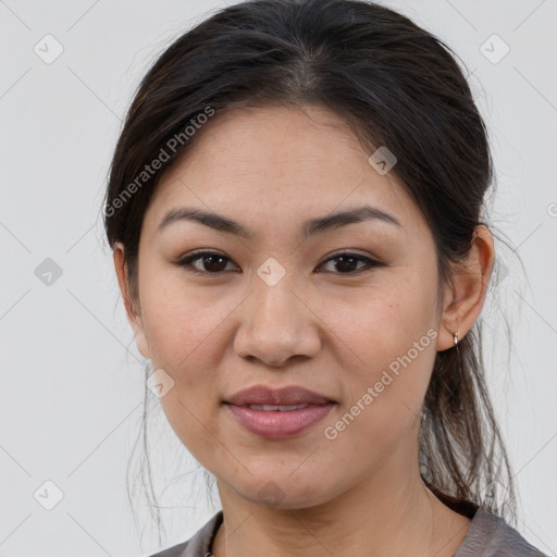 Joyful white young-adult female with medium  brown hair and brown eyes