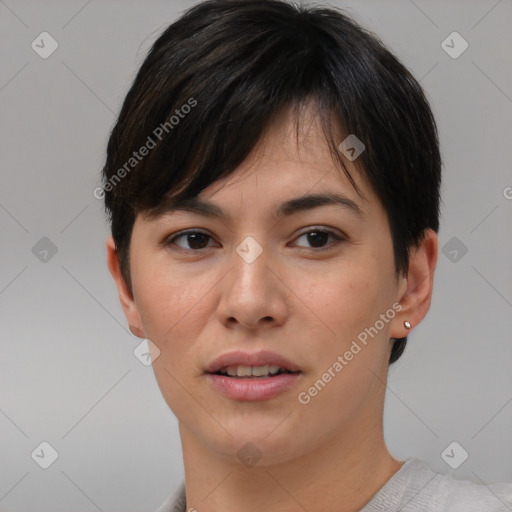 Joyful asian young-adult female with short  brown hair and brown eyes