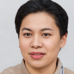 Joyful asian young-adult female with short  brown hair and brown eyes