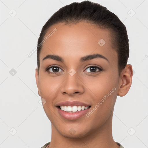 Joyful white young-adult female with short  brown hair and brown eyes