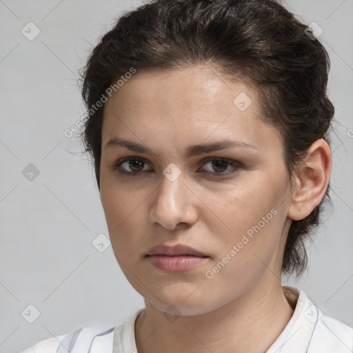 Neutral white young-adult female with short  brown hair and brown eyes