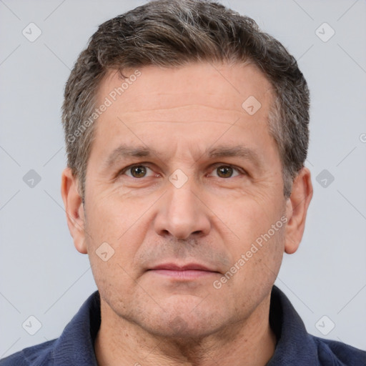 Neutral white adult male with short  brown hair and brown eyes