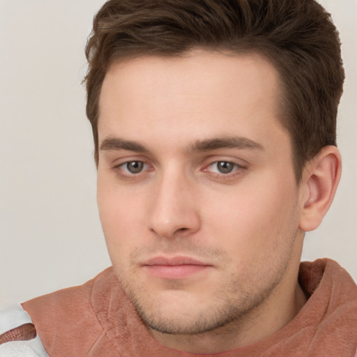 Neutral white young-adult male with short  brown hair and brown eyes