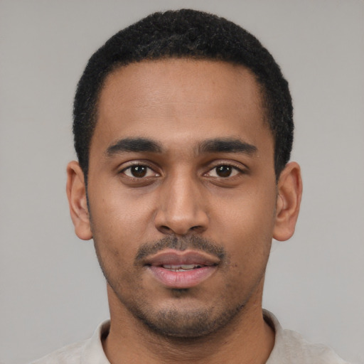 Neutral black young-adult male with short  black hair and brown eyes