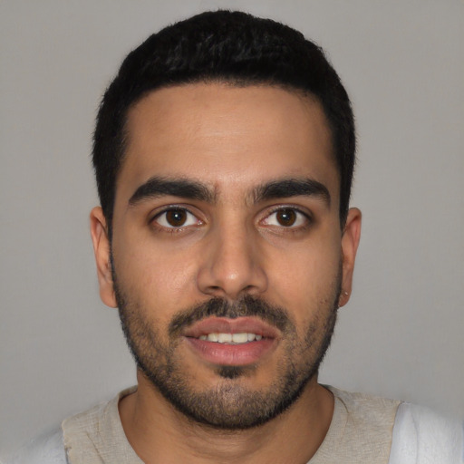 Neutral latino young-adult male with short  black hair and brown eyes