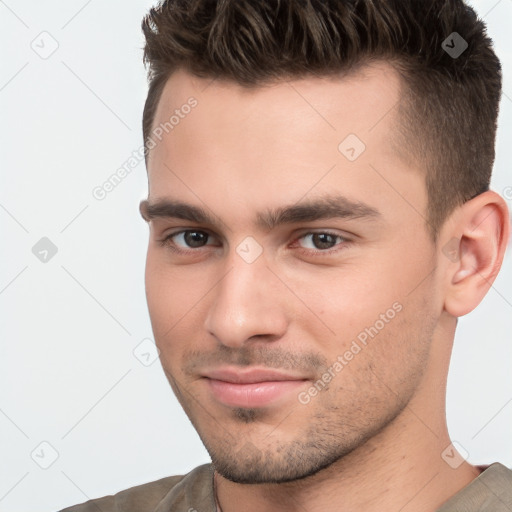 Neutral white young-adult male with short  brown hair and brown eyes