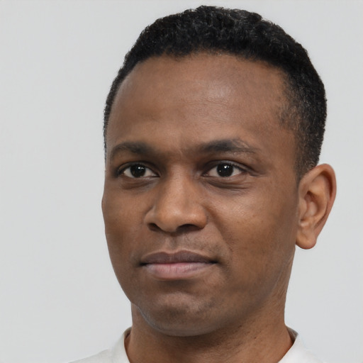 Neutral black young-adult male with short  black hair and brown eyes