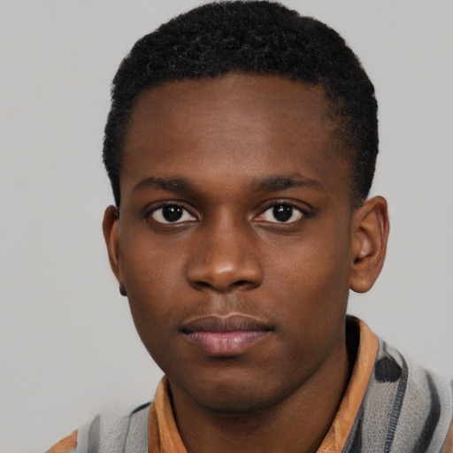 Neutral black young-adult male with short  brown hair and brown eyes