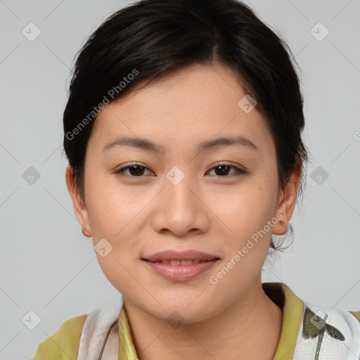 Joyful asian young-adult female with medium  brown hair and brown eyes