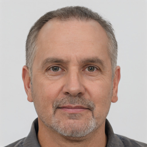 Neutral white middle-aged male with short  gray hair and brown eyes