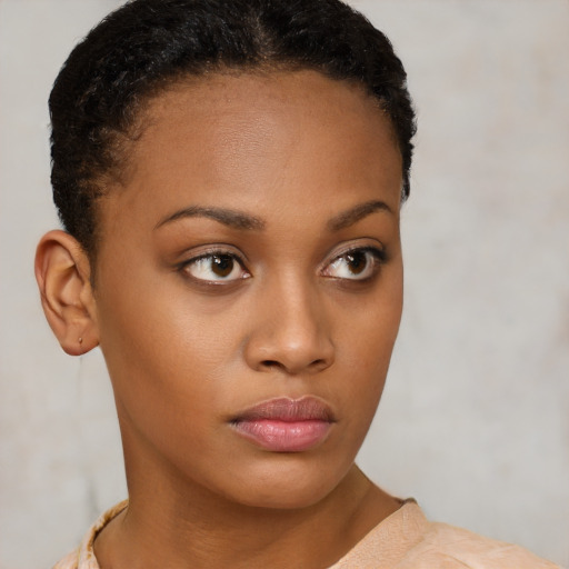 Neutral black young-adult female with short  brown hair and brown eyes