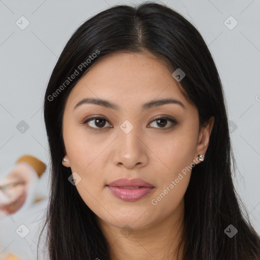 Joyful asian young-adult female with long  brown hair and brown eyes