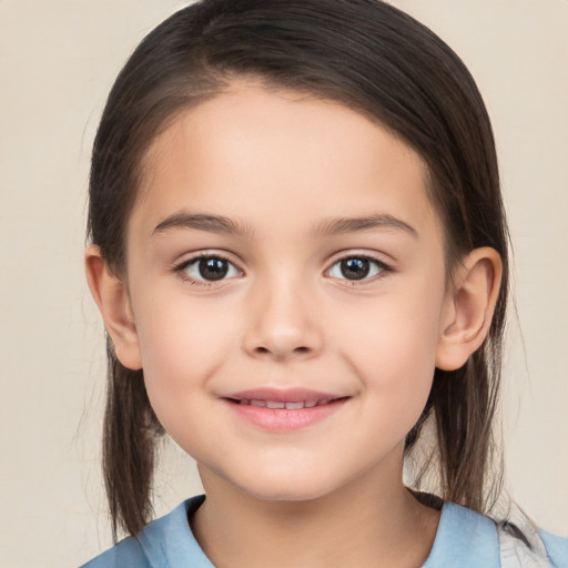 Joyful white child female with medium  brown hair and brown eyes