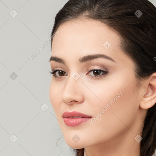 Neutral white young-adult female with long  brown hair and brown eyes