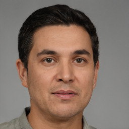 Neutral white young-adult male with short  black hair and brown eyes