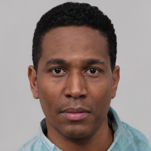 Neutral black young-adult male with short  black hair and brown eyes