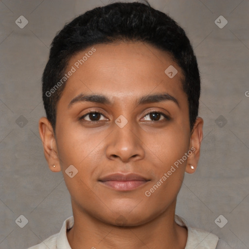 Joyful latino young-adult male with short  brown hair and brown eyes