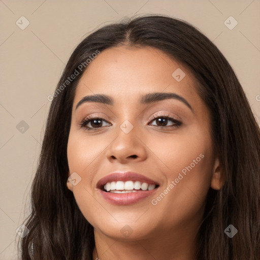 Joyful white young-adult female with long  brown hair and brown eyes