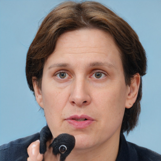 Neutral white adult female with medium  brown hair and brown eyes