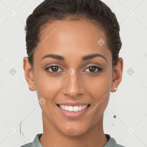 Joyful latino young-adult female with short  brown hair and brown eyes