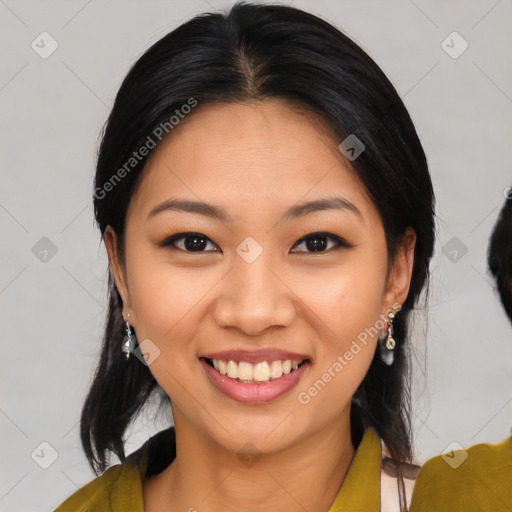 Joyful asian young-adult female with medium  black hair and brown eyes