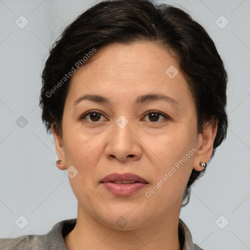 Joyful white adult female with short  brown hair and brown eyes