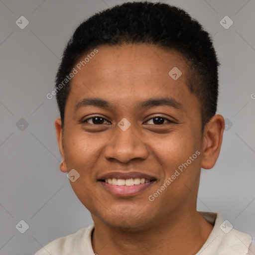 Joyful latino young-adult male with short  black hair and brown eyes