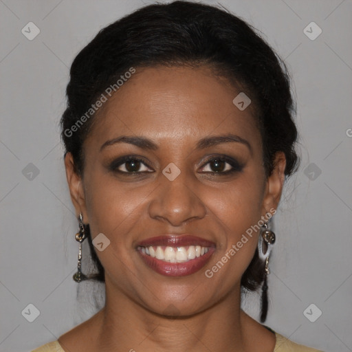 Joyful black young-adult female with medium  brown hair and brown eyes