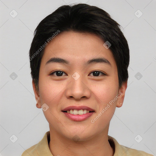 Joyful asian young-adult female with short  black hair and brown eyes