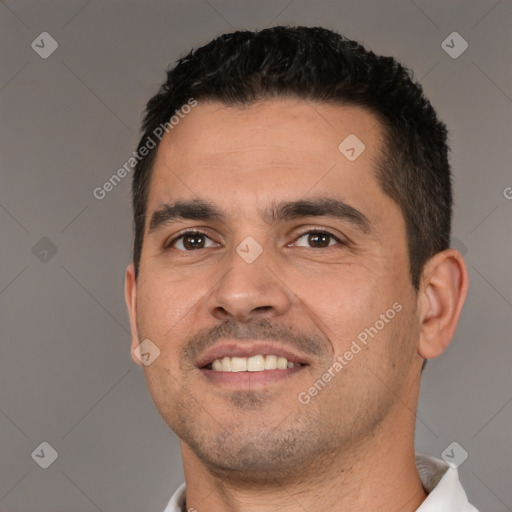 Joyful white young-adult male with short  black hair and brown eyes