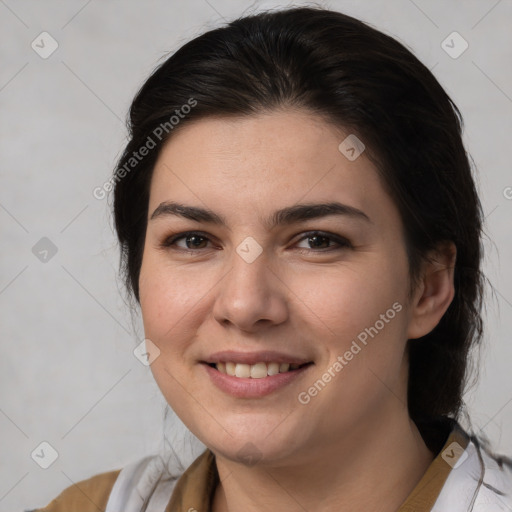 Joyful white young-adult female with medium  brown hair and brown eyes