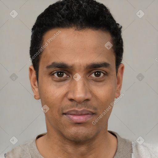 Neutral black young-adult male with short  black hair and brown eyes