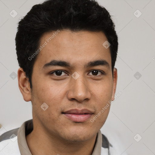 Joyful latino young-adult male with short  brown hair and brown eyes