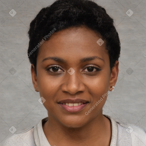 Joyful black young-adult female with short  black hair and brown eyes