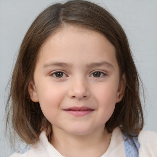 Joyful white child female with medium  brown hair and brown eyes