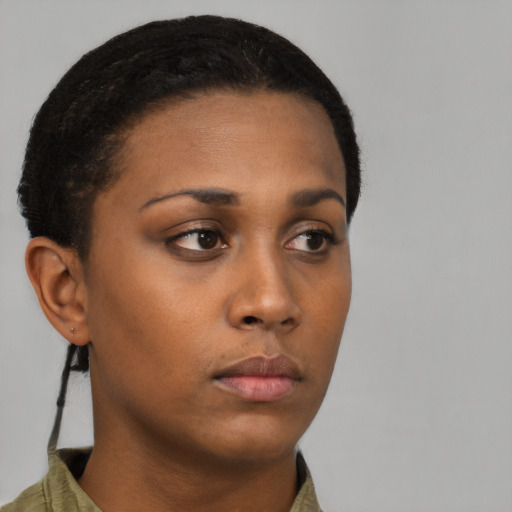Neutral black young-adult female with short  brown hair and brown eyes