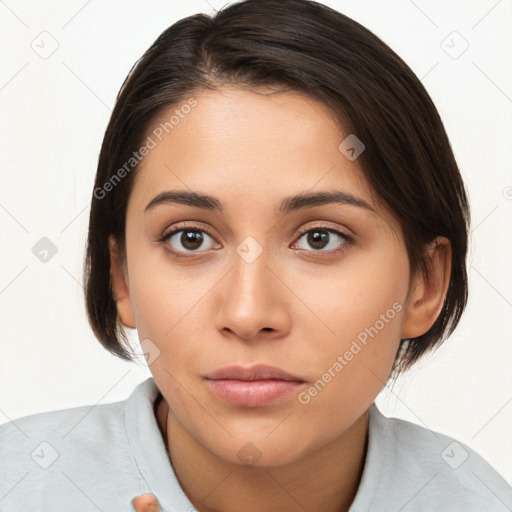 Neutral white young-adult female with medium  brown hair and brown eyes