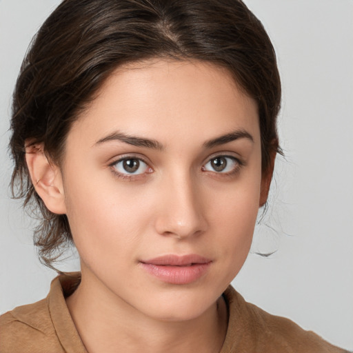 Neutral white young-adult female with medium  brown hair and brown eyes